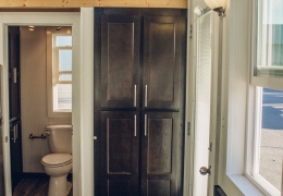 Entry cabinet in dark alder